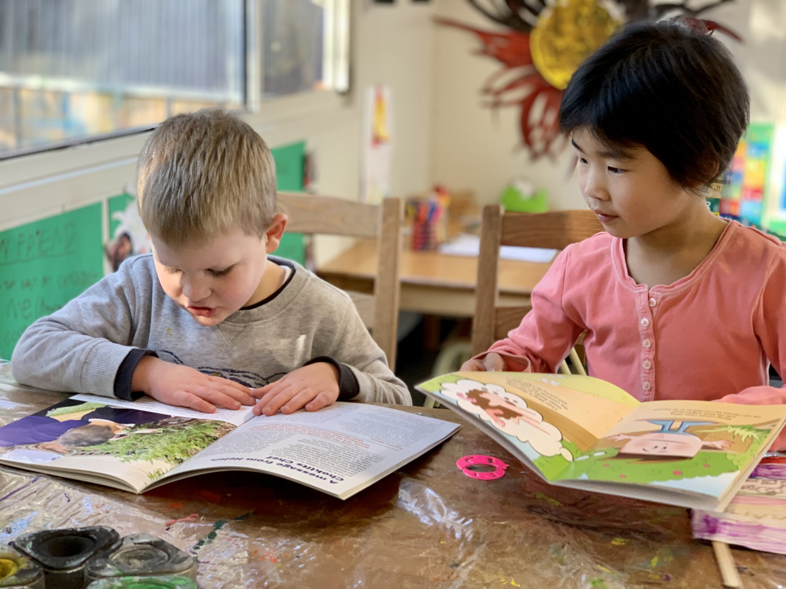 Shared reading time at Choklits Child Care